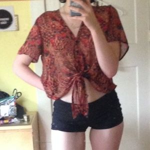 sheer tied orange blouse